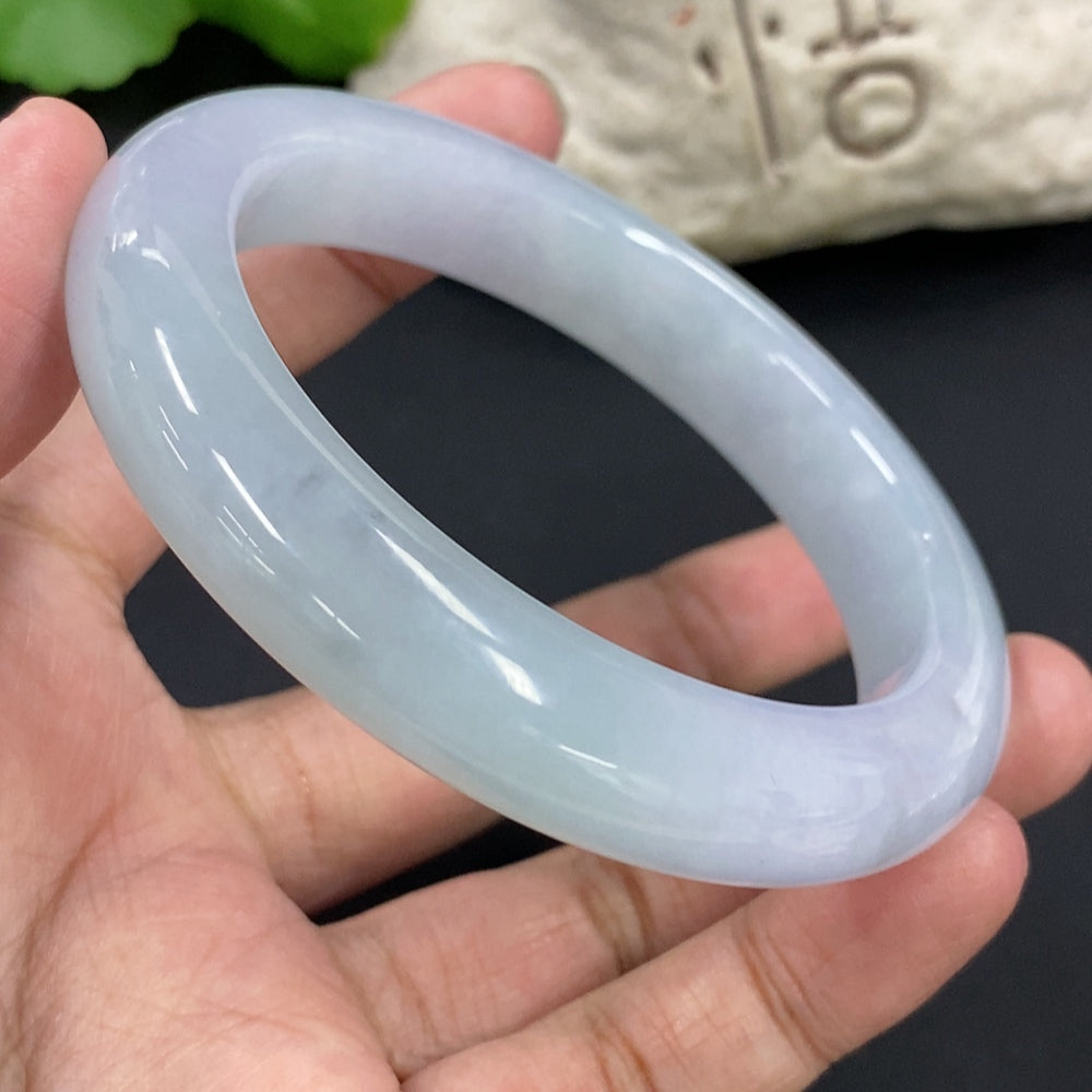 HKHQ jadeite round bangle, 67.3g, size 58.7, showcasing smooth, polished jadeite with a glossy finish.