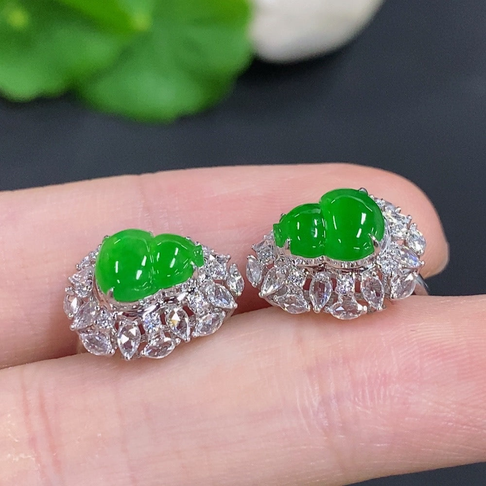 Jadeite gourd earrings with 18K gold and diamond accents, elegant jewelry piece showcasing intricate design and craftsmanship.