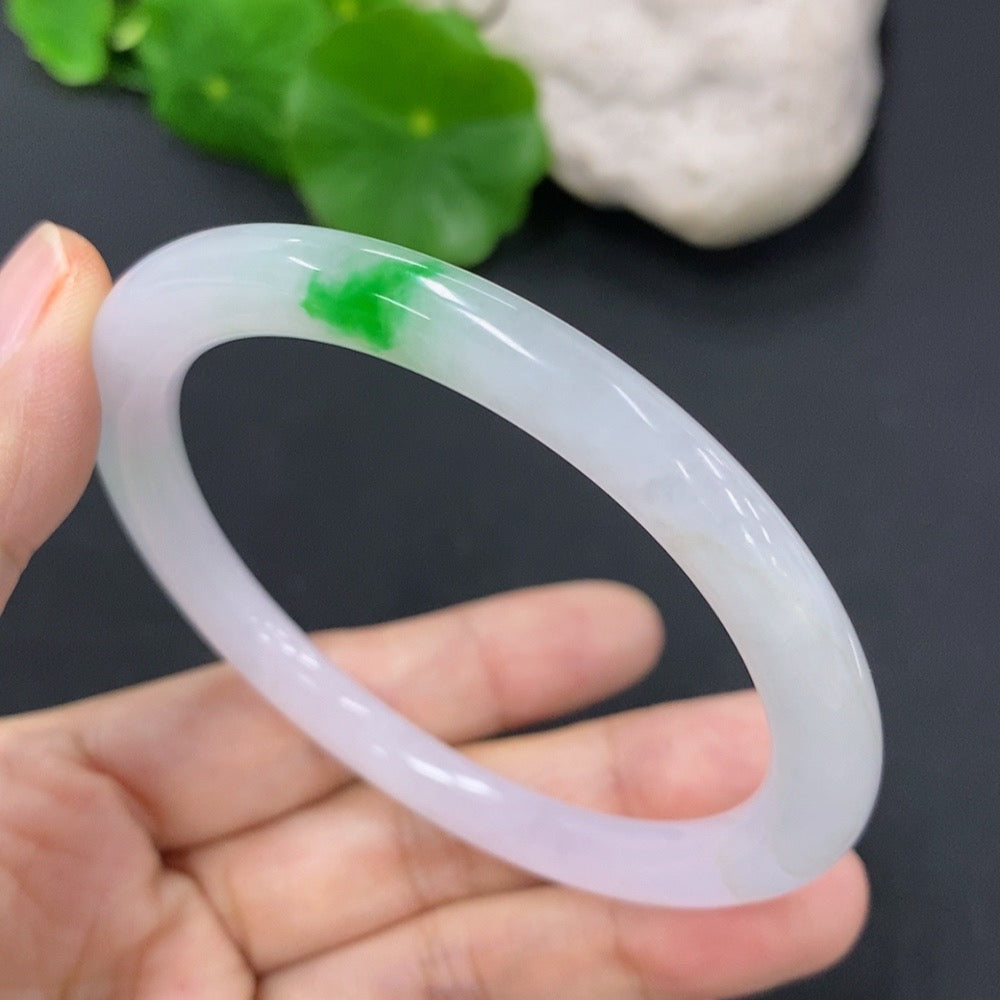 Jadeite round bangle with a 54.5mm diameter, weighing approximately 25.24g, featuring smooth, polished jade surface.