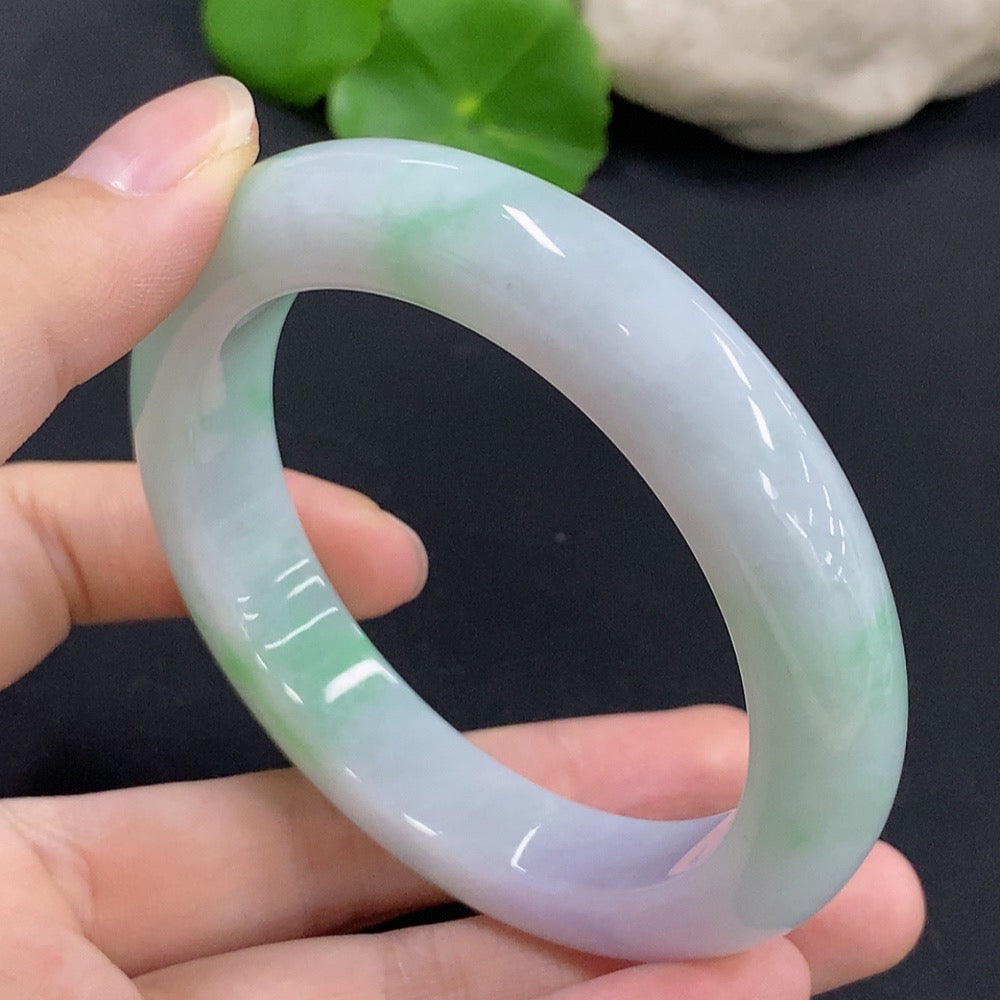 HKHQ jadeite round bangle in size 58.9 with a weight of 76.08g, showcasing smooth, polished jadeite bracelet design.
