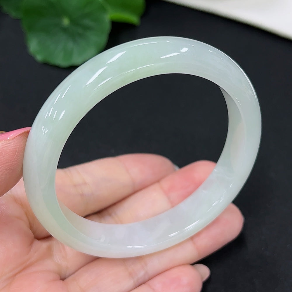HKHQ jadeite round bangle in size 56, weighing 46.3g, featuring smooth, polished jadeite with a classic circular design.