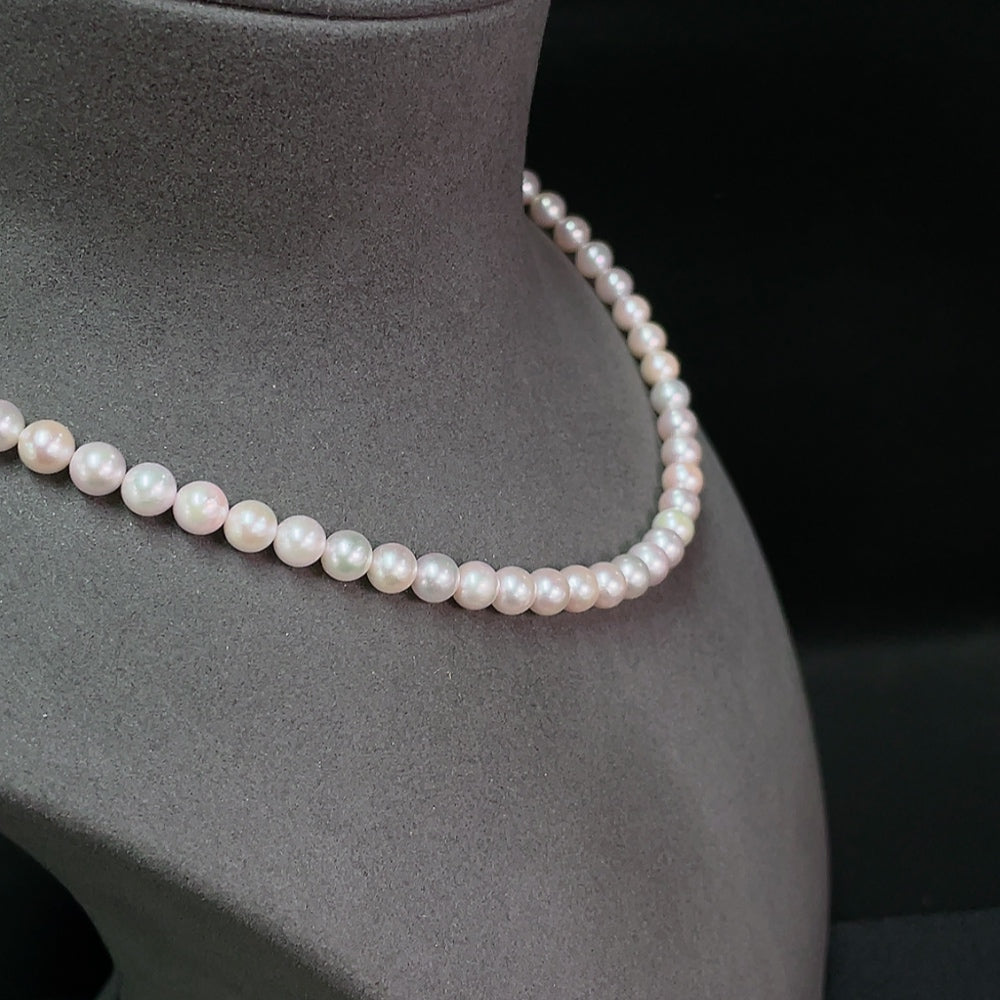 Huiliu seawater pearl necklace with undetermined color, 6.3mm pearls, natural luster, on a delicate chain.
