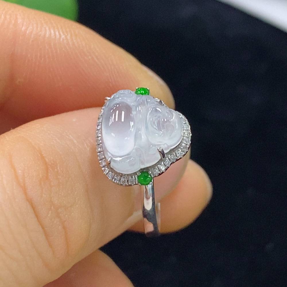 Huiliu Jadeite ring set with diamond accents, featuring a polished jadeite stone and intricate band design.