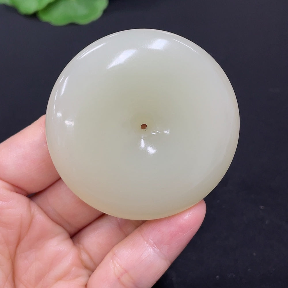 Hetian Jade pendant with peace knot design, crafted from green jade, weighs approximately 58.6 grams, by HKHQ.