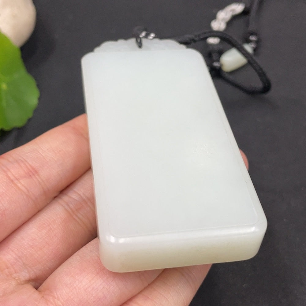 Plain Hetian jade pendant from HUILIU HQ, showcasing smooth, polished jade with a simple, elegant design.
