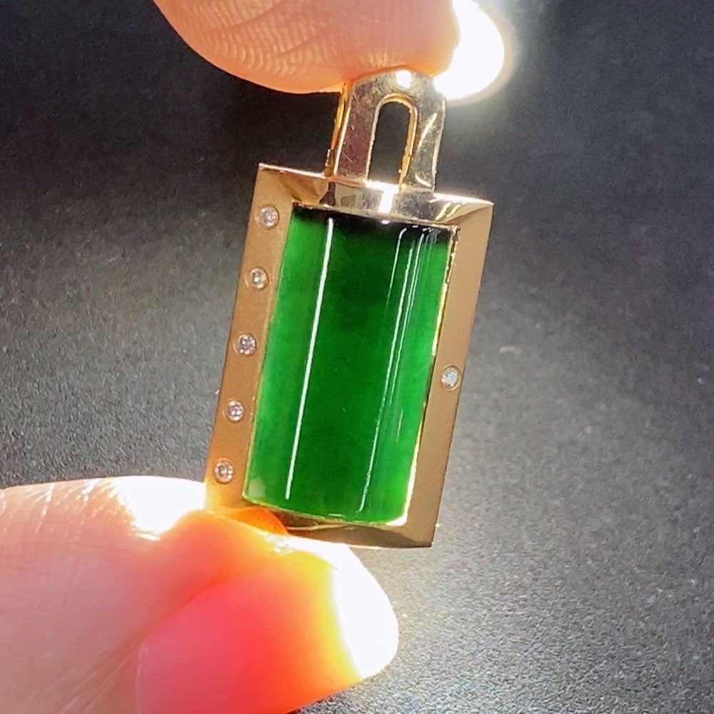 Jadeite inlaid pendant with 18K gold and diamond accents, elegant necklace featuring intricate craftsmanship and vibrant green jade.