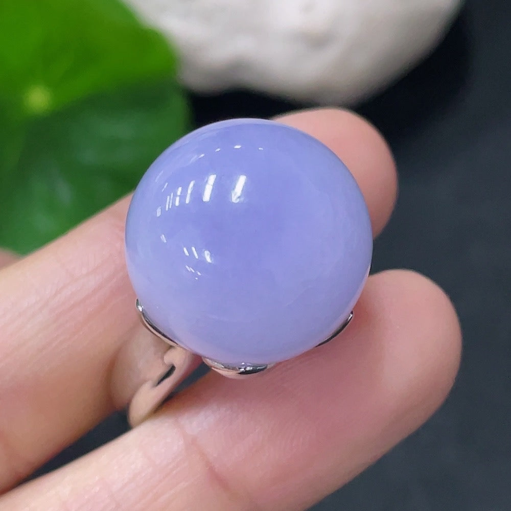 Huiliu Jadeite inlaid ring featuring intricate jade design, certified by Huiliu, showcasing elegant craftsmanship and vibrant green jade.