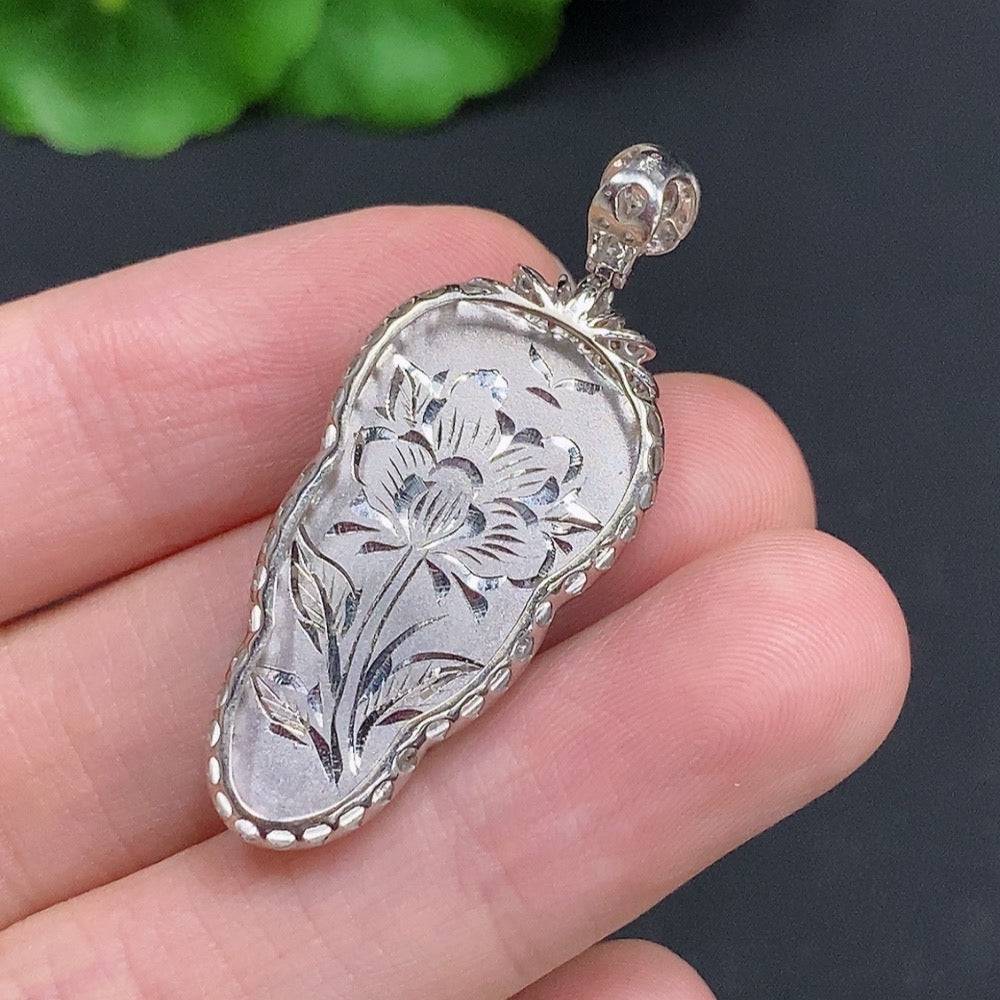 Jadeite leaf pendant with 18k gold and diamond accents, crafted by HUILIU HQ, featuring intricate jade leaf design and sparkling details