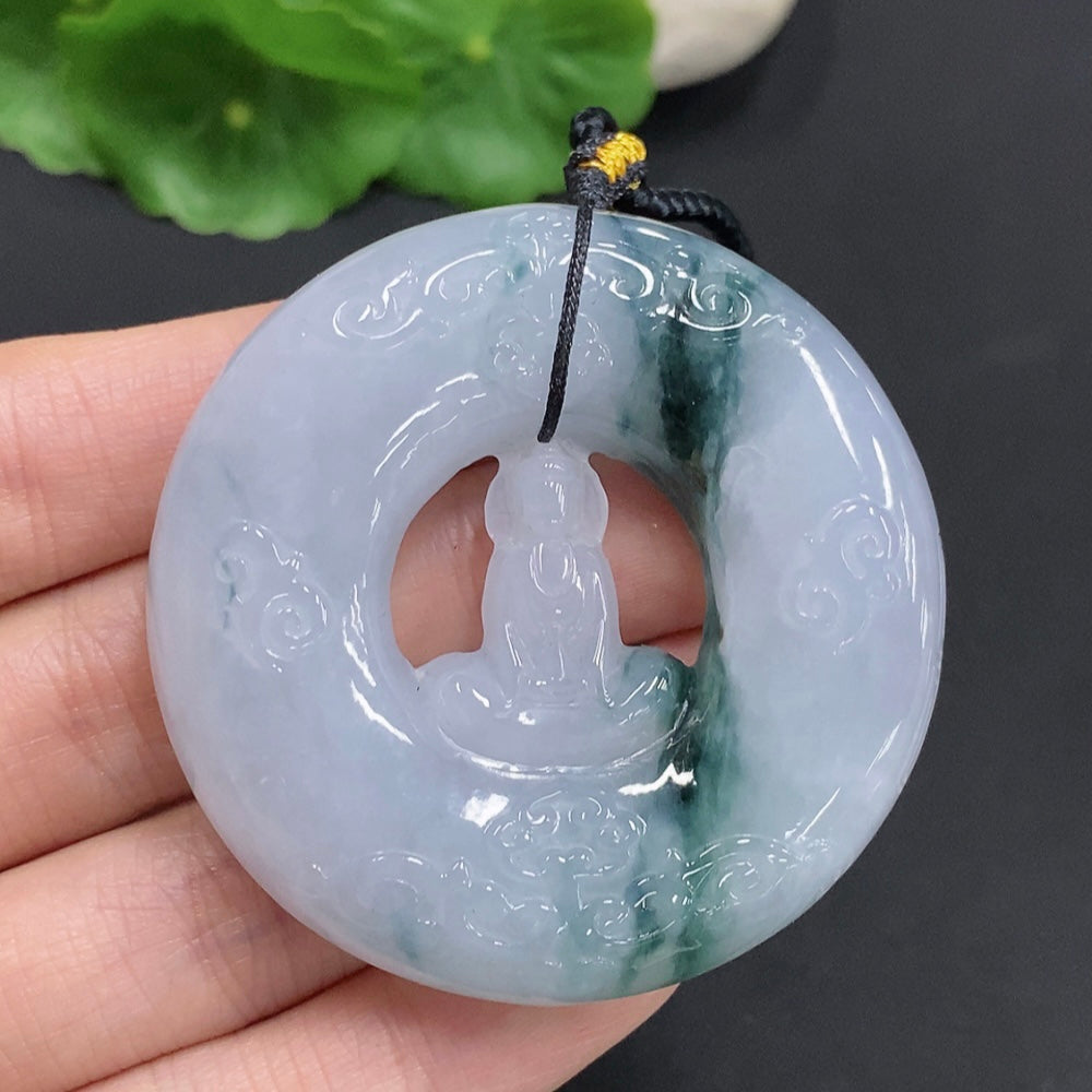 Huiliu Jadeite Enlightenment Pendant featuring smooth, polished green jade with carved details, showcasing elegant craftsmanship.