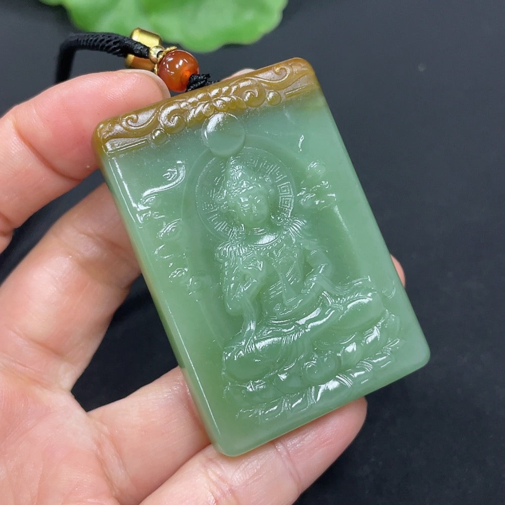 Huiliu certified Hetian jade Guanyin pendant featuring detailed carving and a smooth, polished surface.