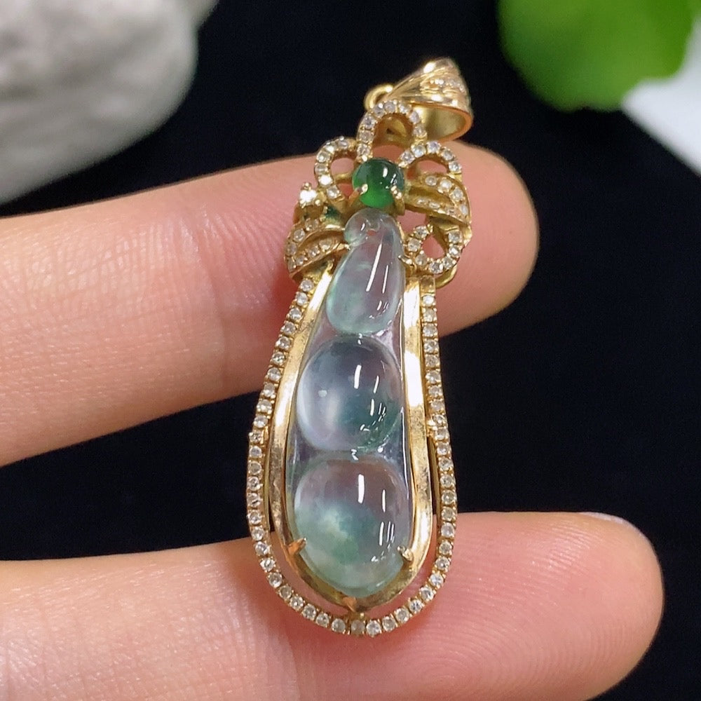 Jadeite Auspicious Bean pendant in 18k gold with diamond accents, featuring intricate inlay design and a total weight of 4.16g.