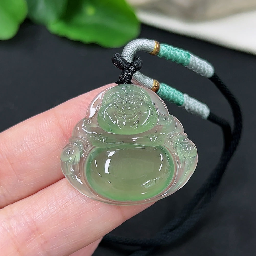 Jadeite Buddha pendant with carved Buddha figure on jade stone, hanging from a rope, weighing approximately 9.2g.
