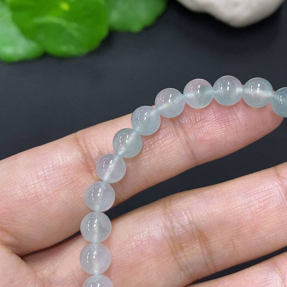Jadeite bead necklace with 5.8mm beads, crafted by HUILIU HQ, featuring smooth, polished jade stones on a delicate string.