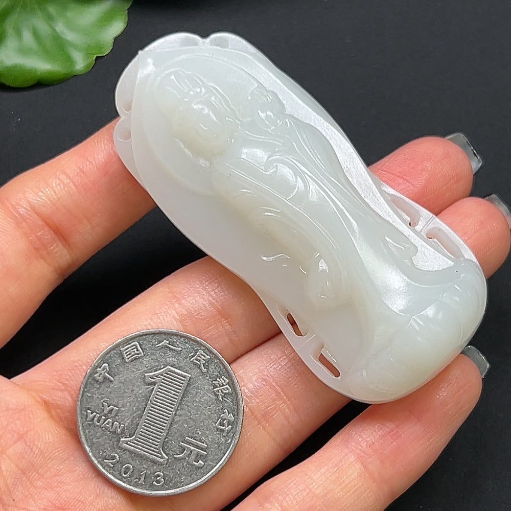 Hetian Jade Guanyin pendant necklace with intricate carved design, crafted by HKHQ, featuring a smooth jade finish and detailed figure.