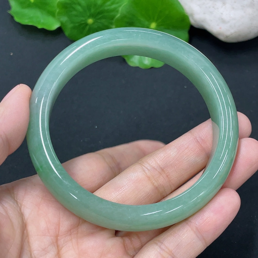HKHQ jadeite round bangle with a total weight of 54.38g and size 56.9, showcasing smooth, polished jadeite craftsmanship.