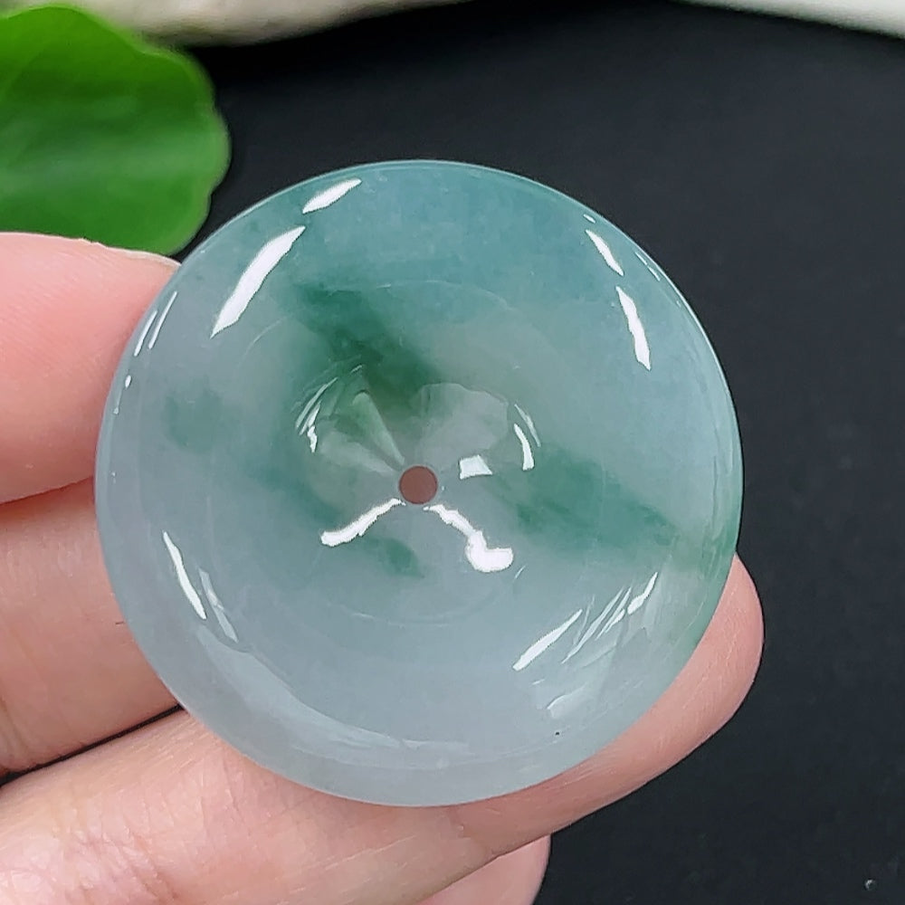 Jadeite Peace Knot pendant from HKHQ with a total weight of 18.9g, featuring smooth jadeite stone carved into a traditional peace knot design.