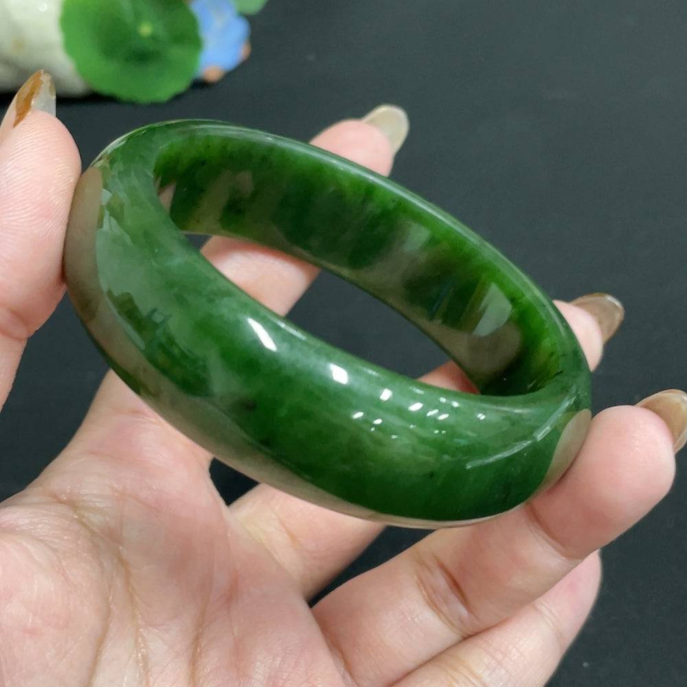 Huiliu certified Hetian Jade Jasper round bracelet featuring smooth, polished jade beads on a delicate elastic band.
