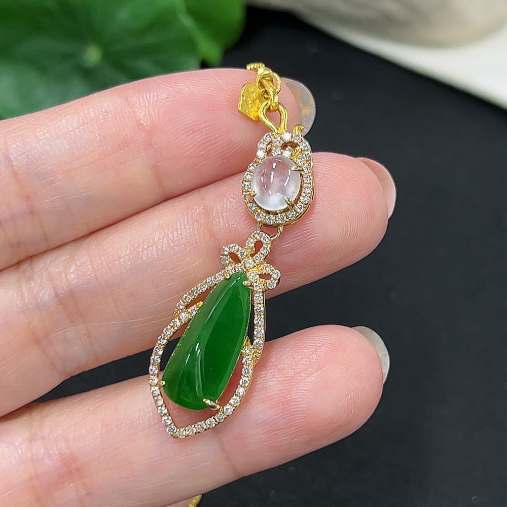 Jadeite inlaid pendant with 18K gold chain and diamond accents, featuring a jade jadeite gemstone, weighing approx. 7.5g.