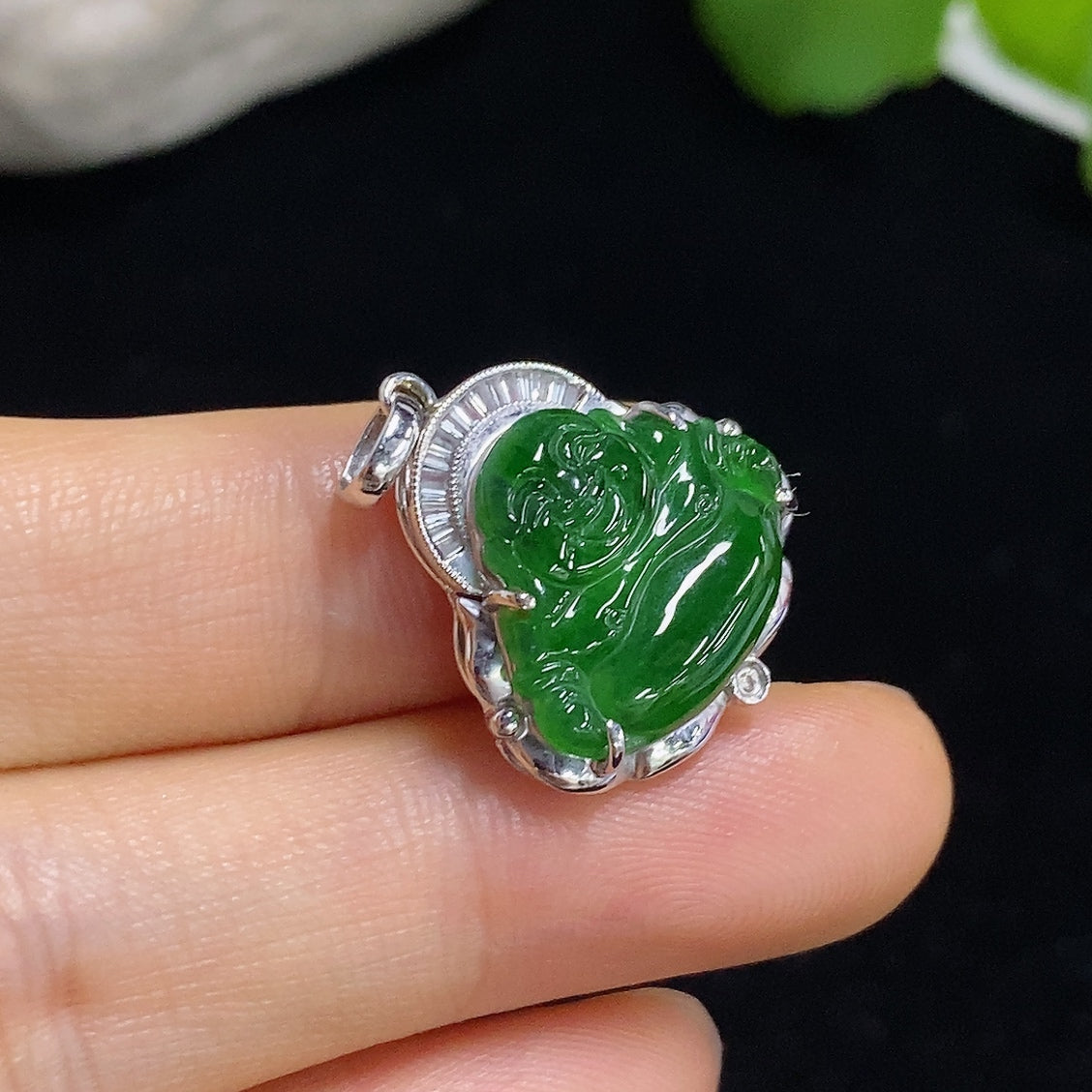 Jadeite Buddha pendant necklace with 18K gold and diamond accents, featuring a detailed Buddha figure on a sleek chain.