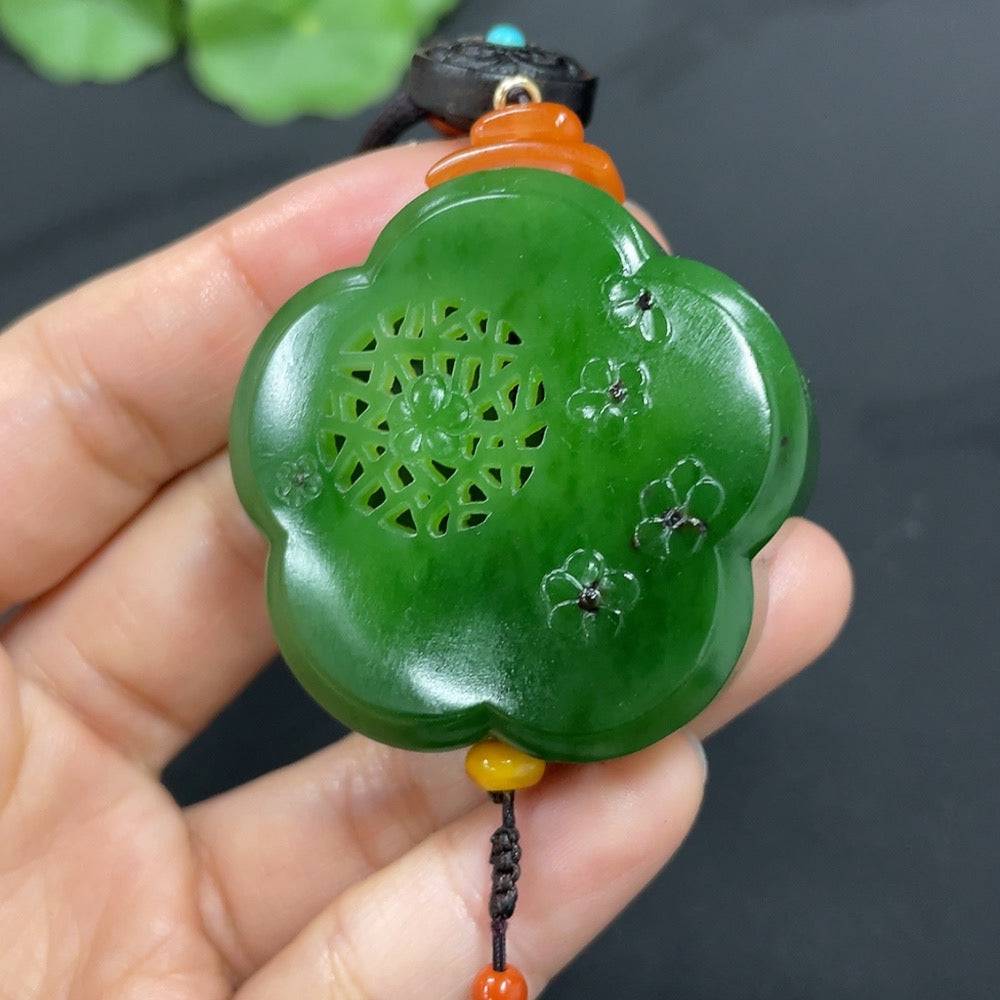 HUILIU HQ Hetian jade jasper pendant featuring blooming flowers and symbols of wealth, showcasing intricate craftsmanship.