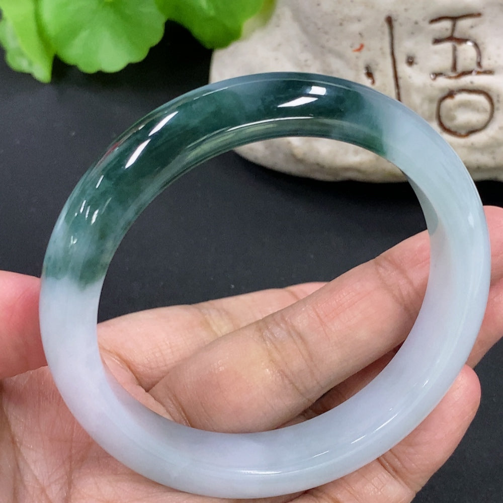 HKHQ jadeite round bangle bracelet, 55.5mm size, 51.68g, smooth green gemstone jewelry, natural and polished appearance.