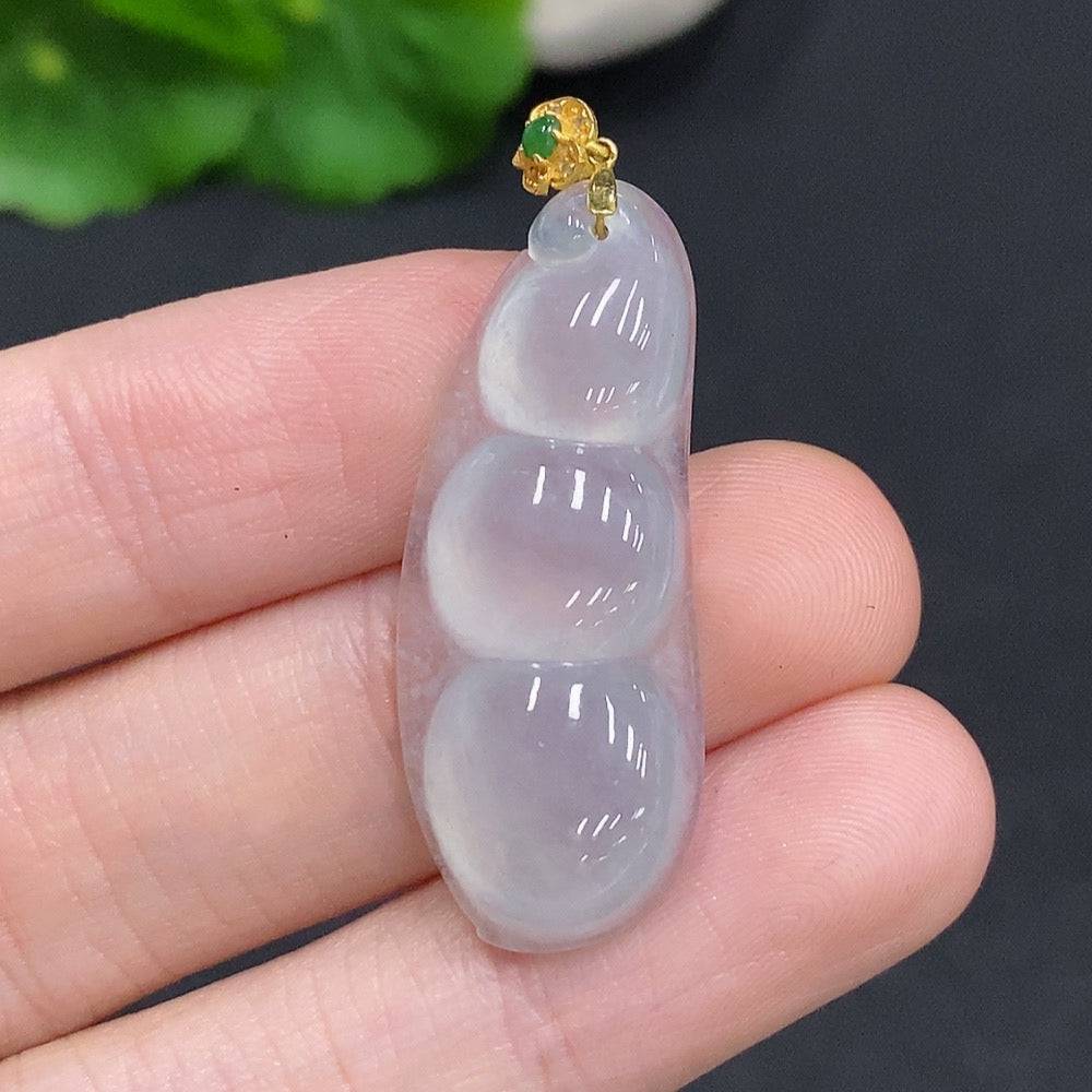 Jadeite lucky bean pendant with 18K gold clasp, diamond accents, weighing about 5g, crafted by HUILIU HQ, shown close-up.