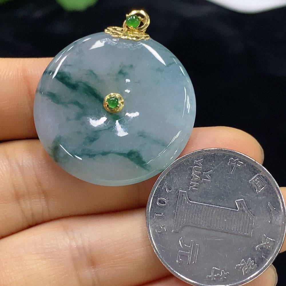 Huiliu Jadeite Peace Buckle Pendant featuring polished green jadeite jade, shaped in a peaceful, elegant design.