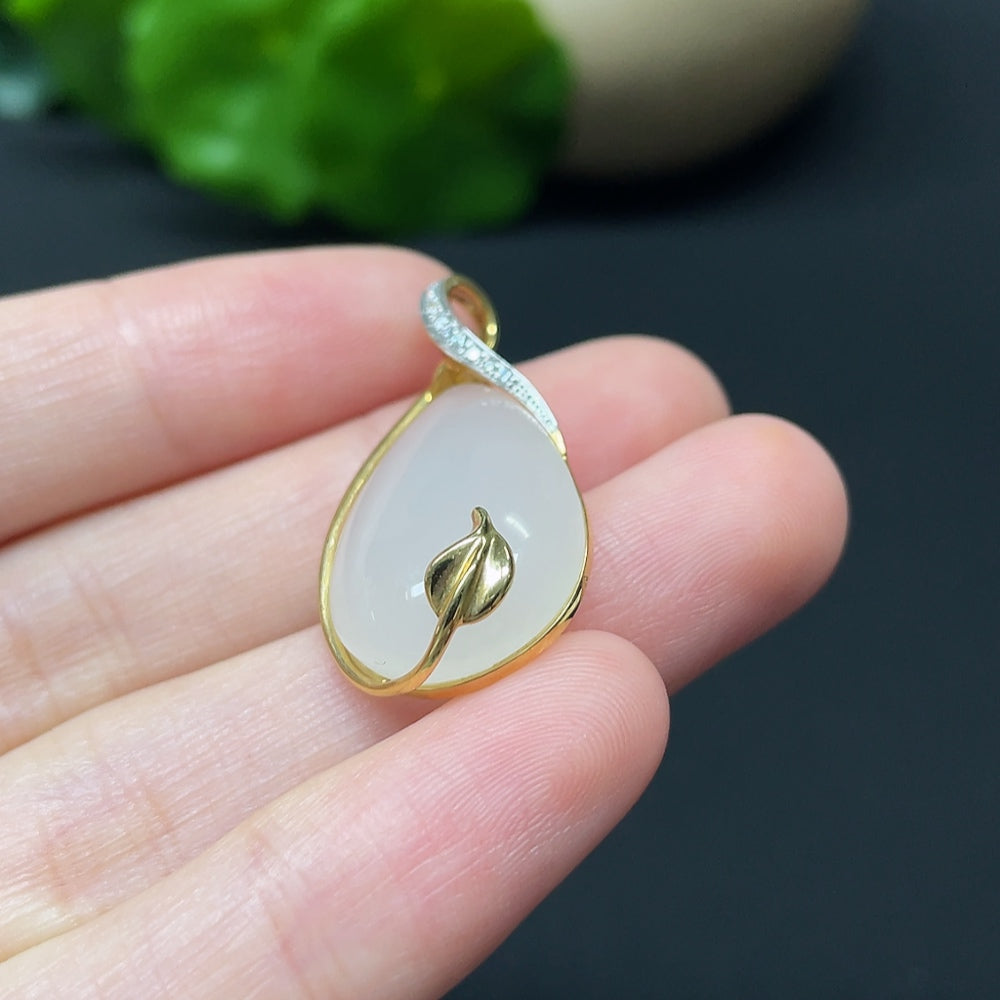 Hetian jade water drop pendant necklace by HKHQ featuring 18K gold and diamond accents, showcasing intricate craftsmanship.