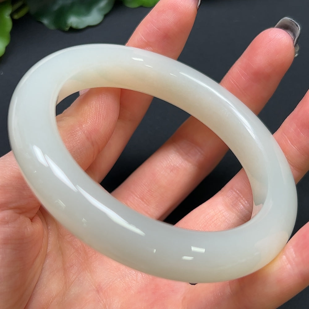HKHQ Hetian jade round bracelet, 58.9mm, weighing approximately 67.83g, showcasing smooth, polished green jade beads.