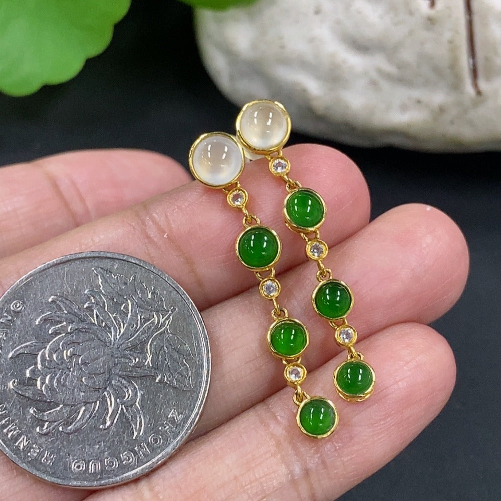 Jadeite cabochon earrings in 18K gold, non-diamond jewelry featuring smooth, polished jadeite stones with gold settings.