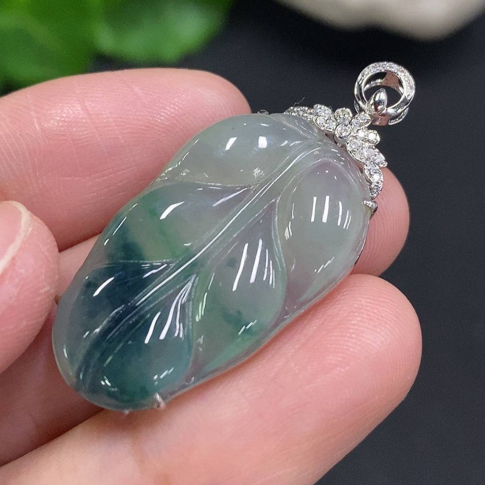 Jadeite leaf inlay pendant with diamond accents, crafted by HUILIU HQ, 18K gold, showcasing detailed jade and gold craftsmanship.