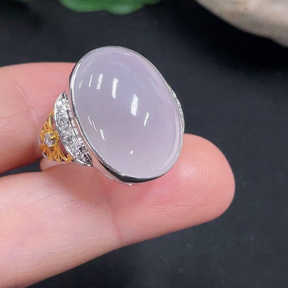 Huiliu Jadeite ring with diamond accents, showcasing a smooth green jade gemstone and sparkling diamond details.