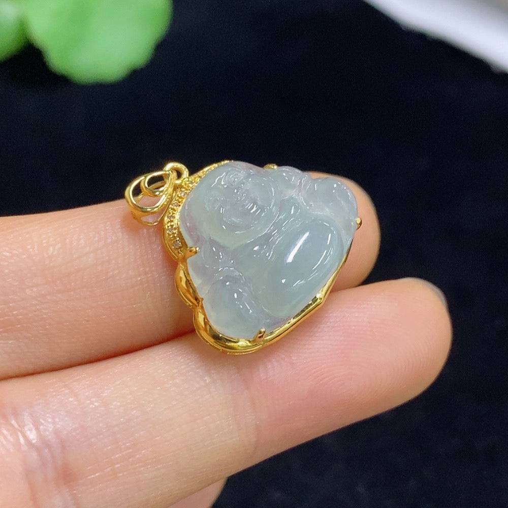 Huiliu jadeite Buddha pendant with inlaid details, showcasing intricate craftsmanship and smooth, polished jade surface.