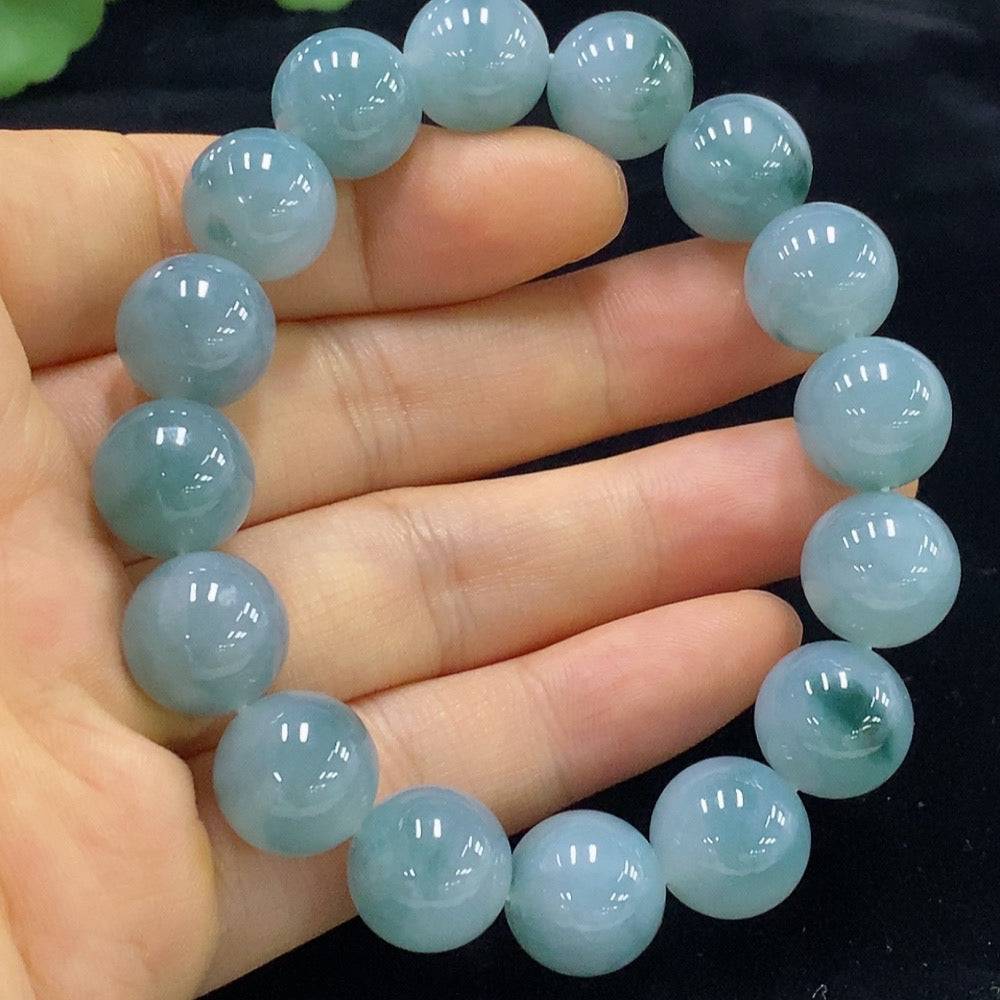 HUILIU HQ jadeite bracelet with 12.5mm beads, showcasing smooth, polished green jade beads on a white background.