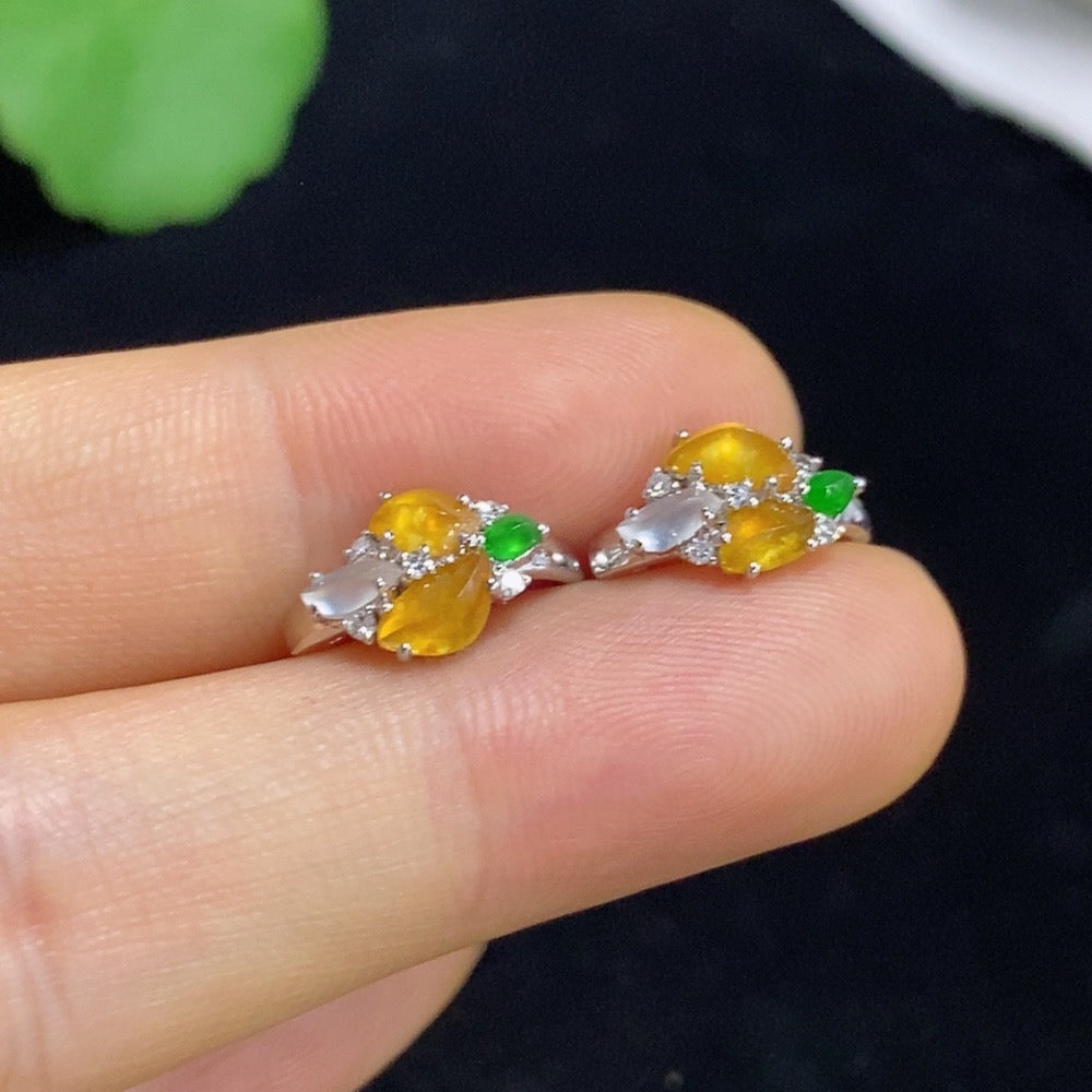 Jadeite ear clips with 18k gold and diamond accents, total weight approximately 2.18 grams