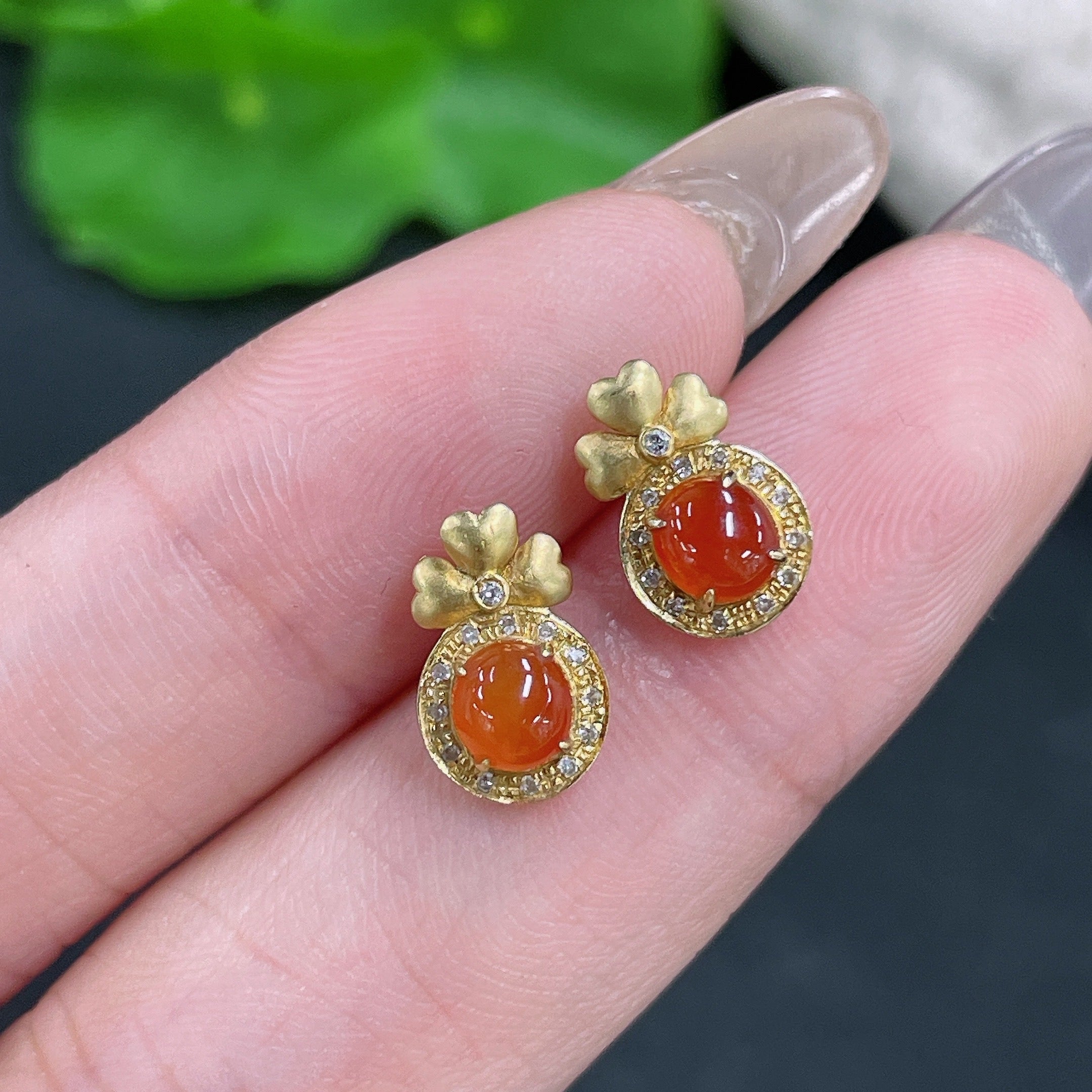 HUILIU HQ jadeite cabochon earrings with 18K gold and diamond accents, showcasing polished jade and elegant design.