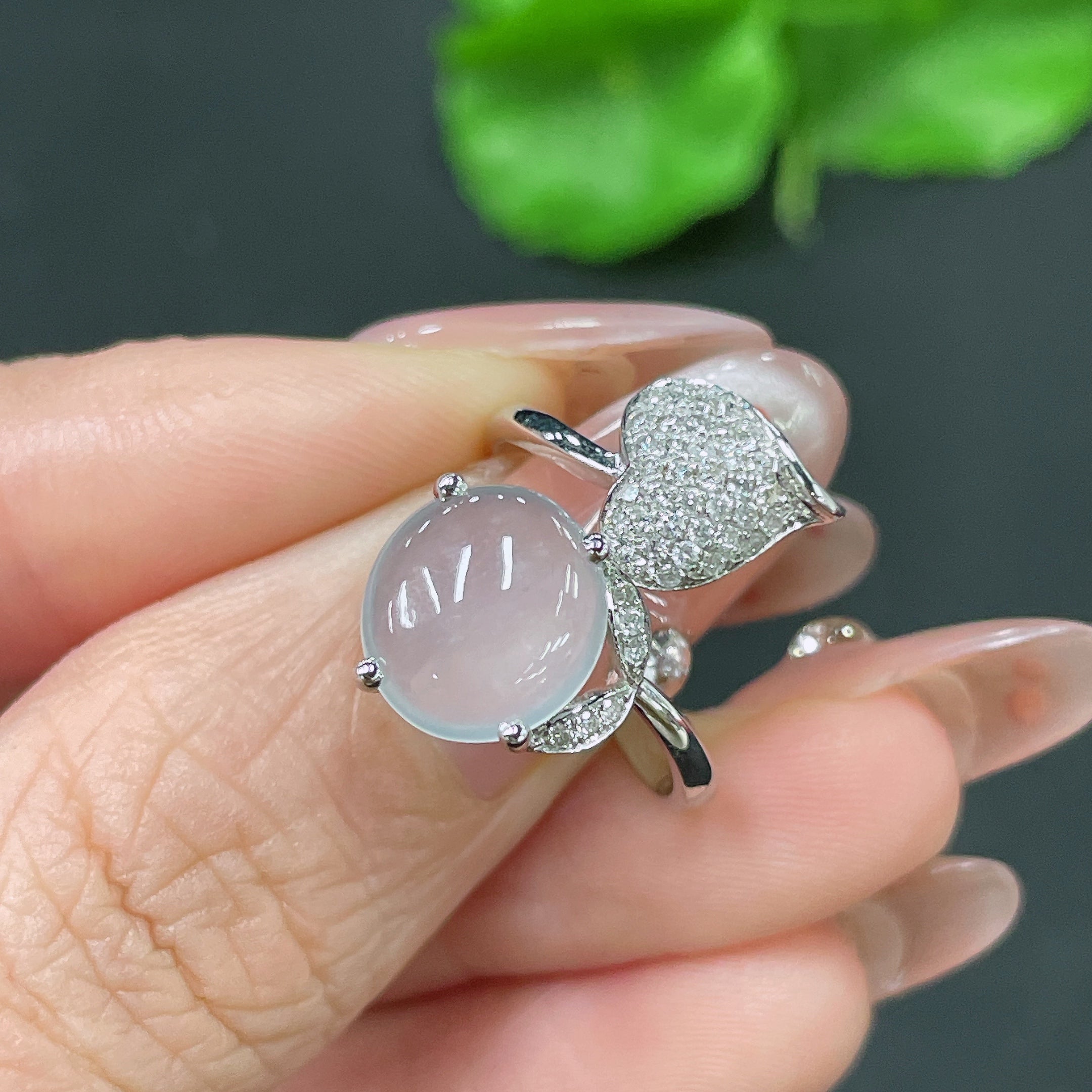 Jadeite cabochon ring with 18k gold band and diamond accents, size 12, crafted by HUILIU HQ, showing the detailed gemstone and gold setting.