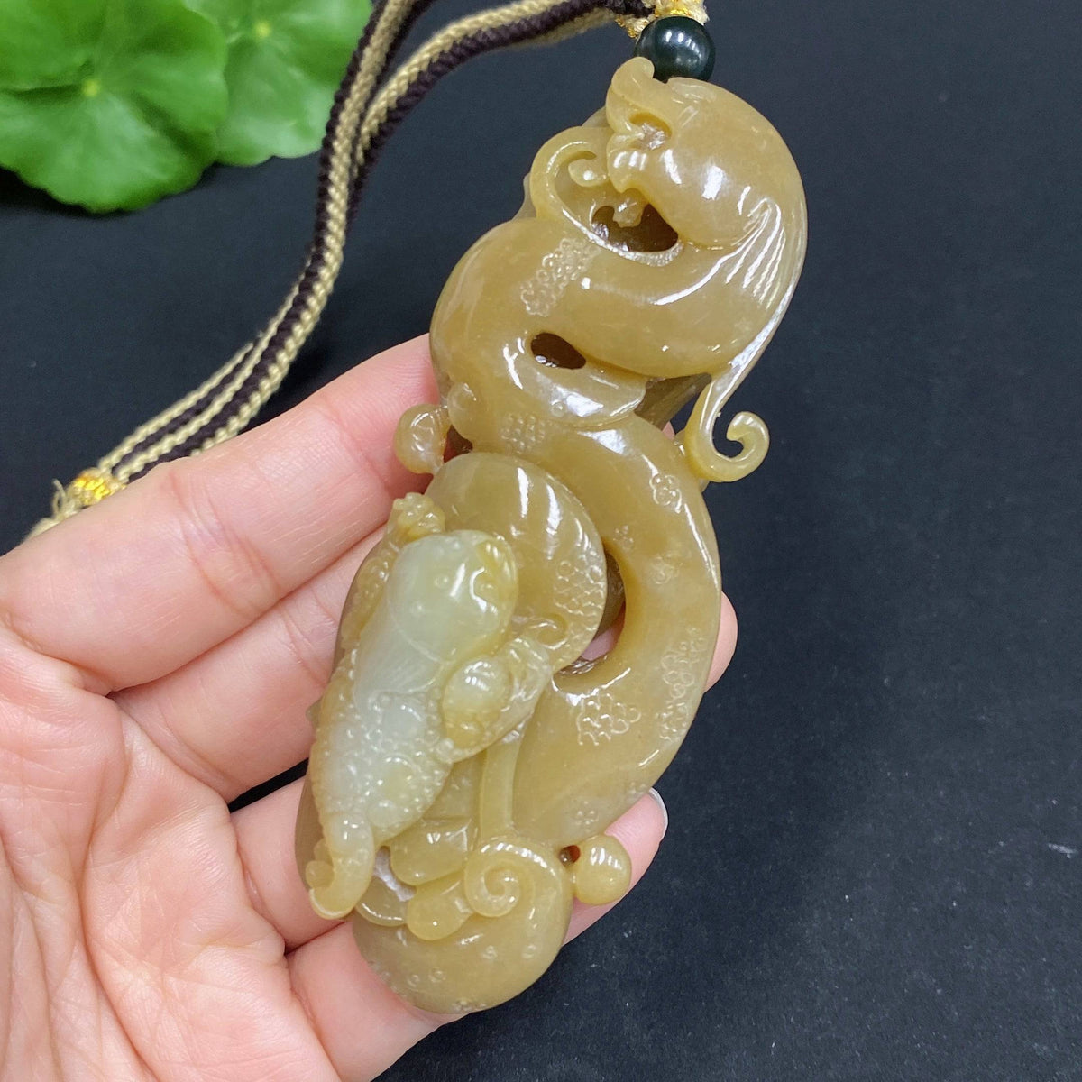 Huiliu HQ Hetian Jade handheld carving of a three-legged golden toad, detailed jade sculpture with intricate features.