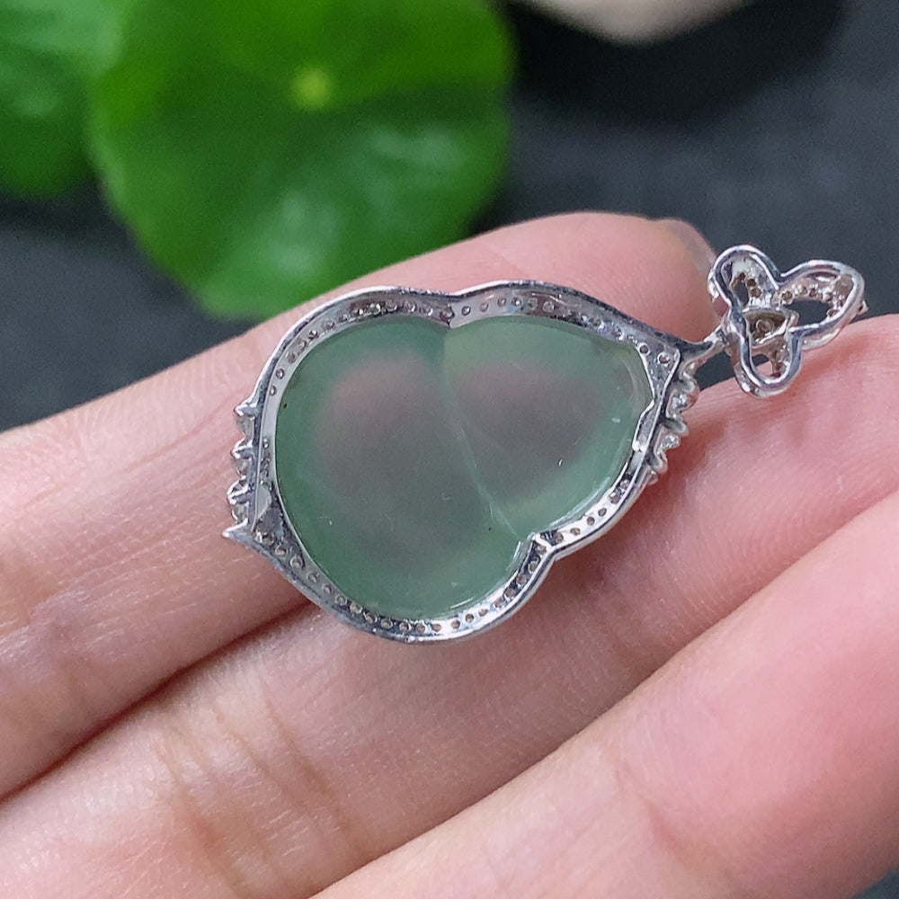 HUILIU HQ jadeite inlaid gourd pendant with diamond accents, showcasing intricate craftsmanship and vibrant green jade color.