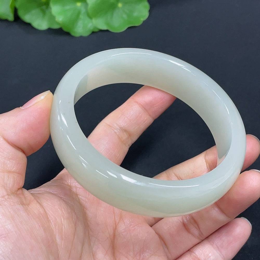 Huiliu Certified Hetian Jade round bracelet featuring smooth, polished jade beads on a delicate string.