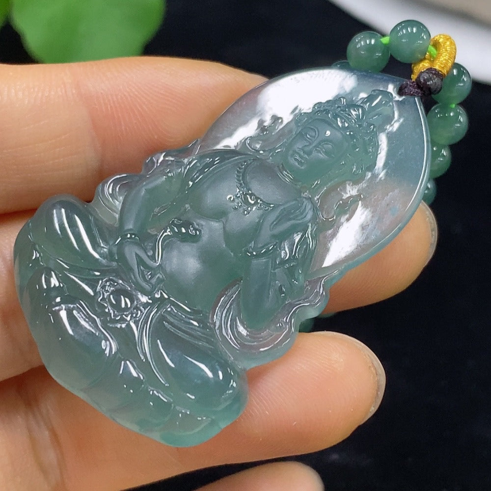 Jadeite Guanyin pendant with intricate carving, weighing approximately 38.18g including chain, from HUILIU HQ.