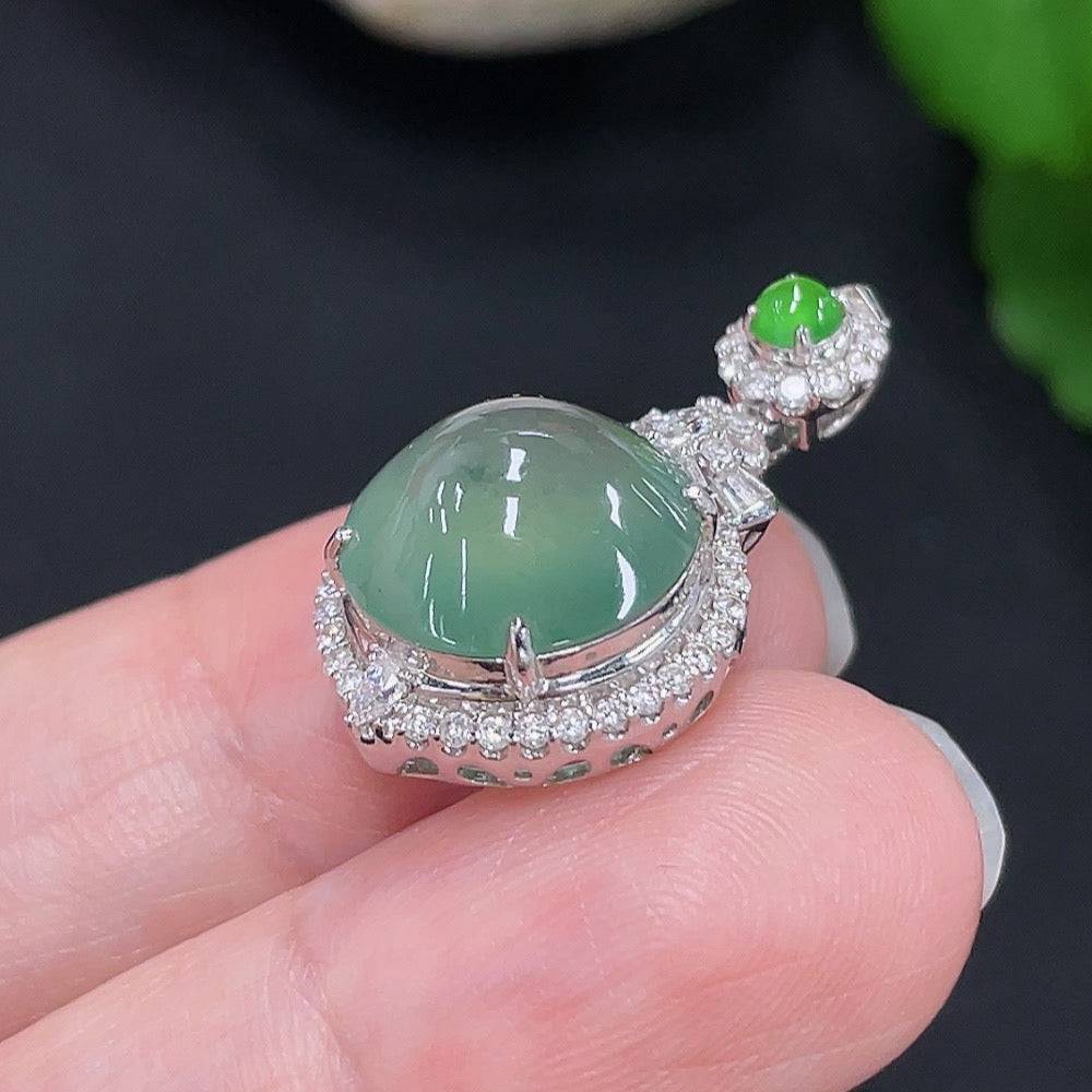 Jadeite inlaid pendant with diamond accents, crafted by HUILIU HQ, featuring 18K gold setting and a polished jade jade stone.