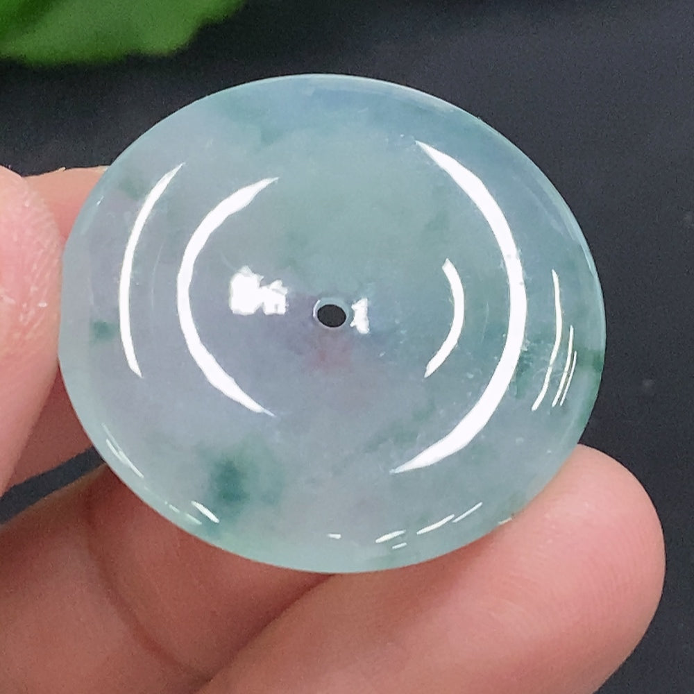 Huiliu certified jadeite Peace Knot pendant featuring intricate design and smooth green jade surface.