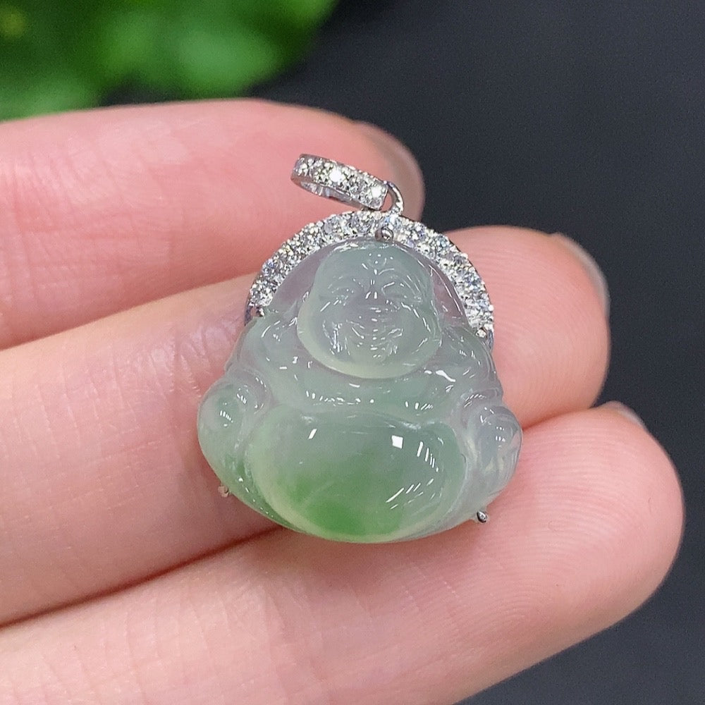 Jadeite Buddha pendant by HUILIU HQ with 18K gold accents and diamond details, showcasing a detailed carved Buddha figure.