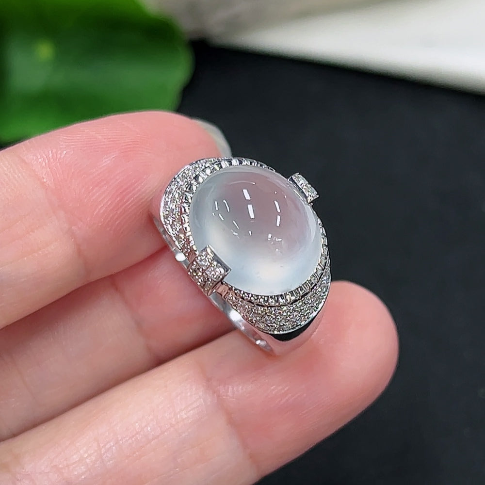 Elegant jadeite inlaid ring with 18K gold and diamond accents, showcasing intricate jewelry craftsmanship.