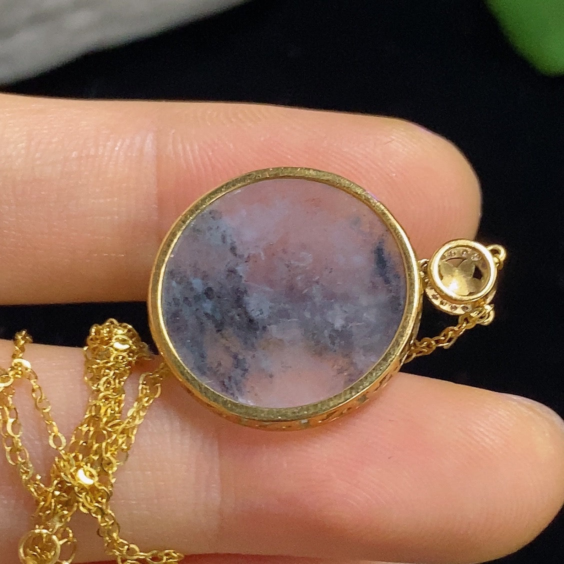 Jadeite plain pendant with 18k gold and diamond inlay, HKHQ jade jewelry, showcasing the pendant's smooth surface and elegant design.