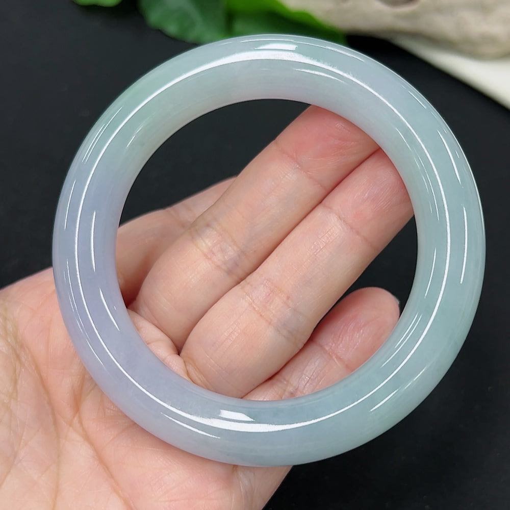 HKHQ jadeite round bangle, size 55.2, weighing 73.56g, featuring smooth, polished jadeite surface and classic circular design.
