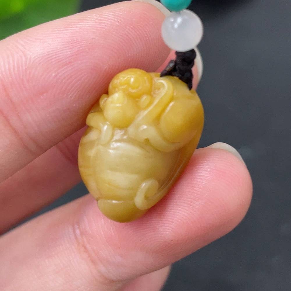 Hetian Jade Spirit Monkey pendant with rope, Huiliu certified, featuring undetermined skin color and non-Hetian jade beads.