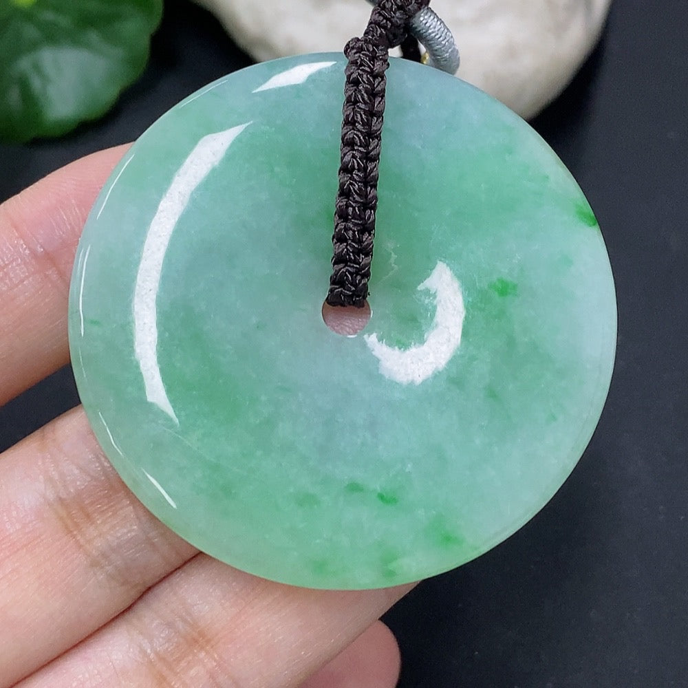 Jadeite peace knot pendant from HKHQ with a 5-meter cord, showcasing a smooth, polished jade jade jewelry piece.