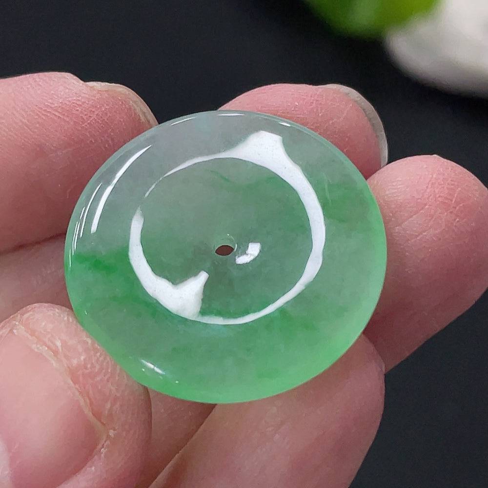 Jadeite Peace Knot pendant from HUILIU HQ, intricately carved jade jewelry weighing approximately 5.4 grams.